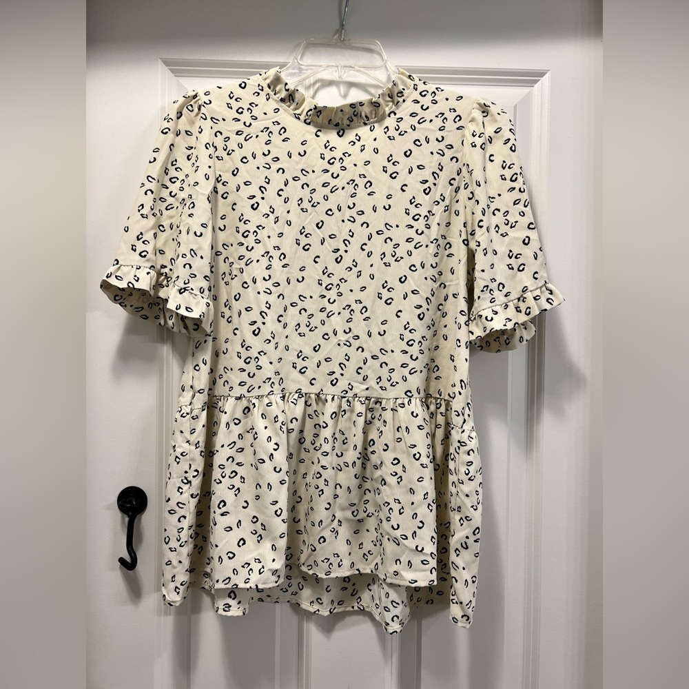 EUC peplum top. Perfect for work.